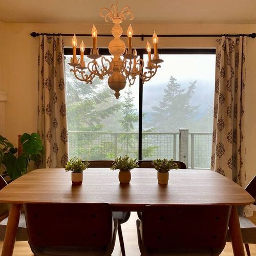 Dining room with trees and fog