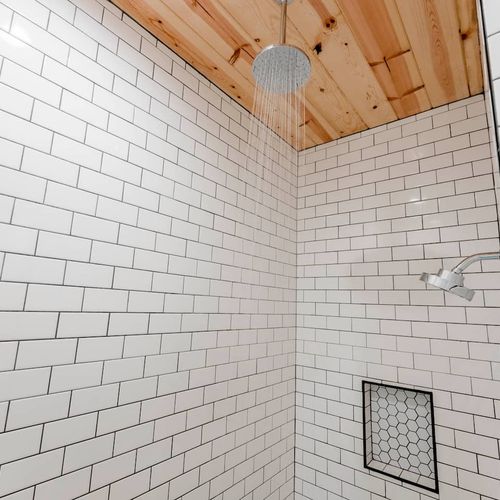 Beautiful walk-in shower with rain head.
