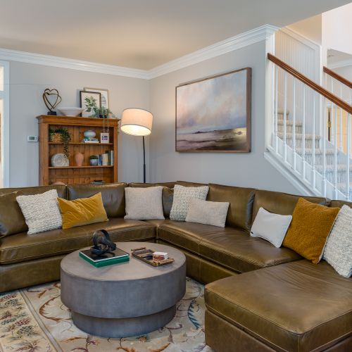 Spacious living room to sit by the fire and enjoy conversation or a movie