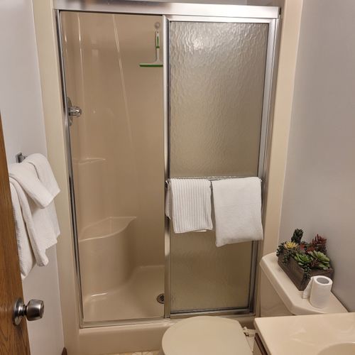 Bathroom #1:  private en suite full bathroom with walk-in shower for bedroom #1.