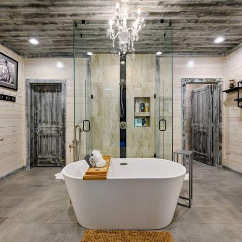 The bathroom has an oversized soaking tub as well as a walk-in shower.