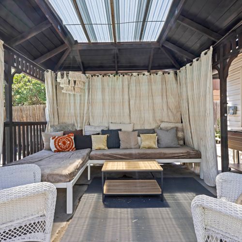 Bask in the warmth of this perfect sunroom