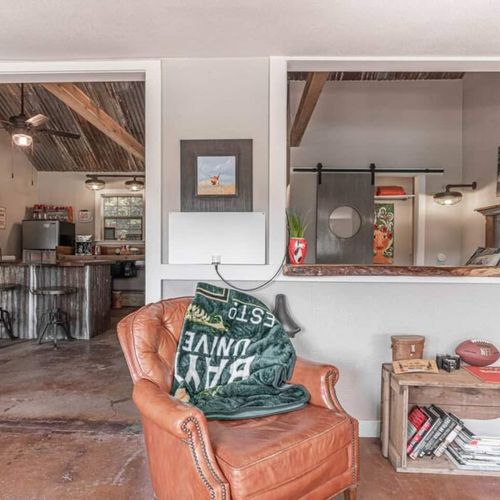 Take a book from the mini library and relax on the reading chair in the cabin