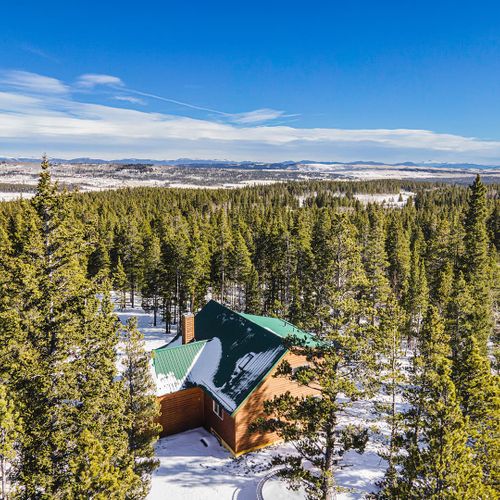 Peaceful winter retreat nestled deep in the pines, offering total privacy and breathtaking alpine scenery.