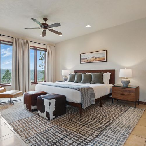Cozy, grounded bedrooms for a true getaway feel.