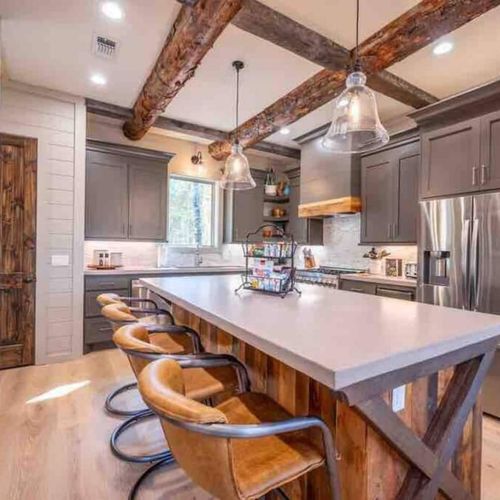 The fully equipped kitchen has additional seating at the bar top!