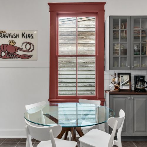 Vibrant dining space w/ bold color & character-filled details.