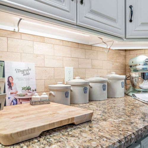 Beautiful Kitchen with Sleek Stone Countertops Fully Equipped