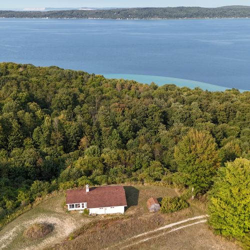 Overview:  another view of crystal lake with view of sleeping bear sand dunes and lake michigan in the distance
