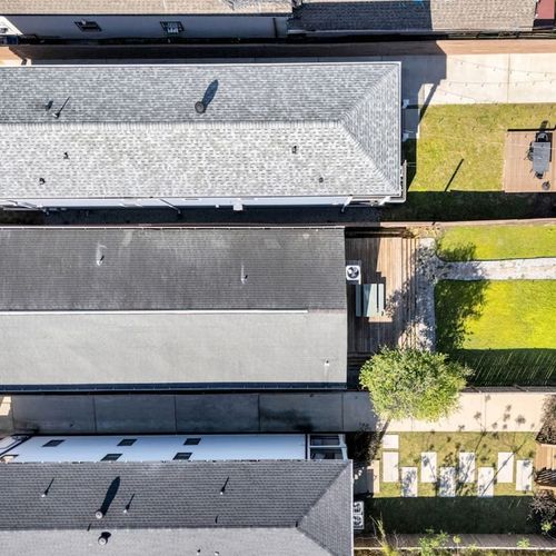 Aerial view of the property & its surroundings.
