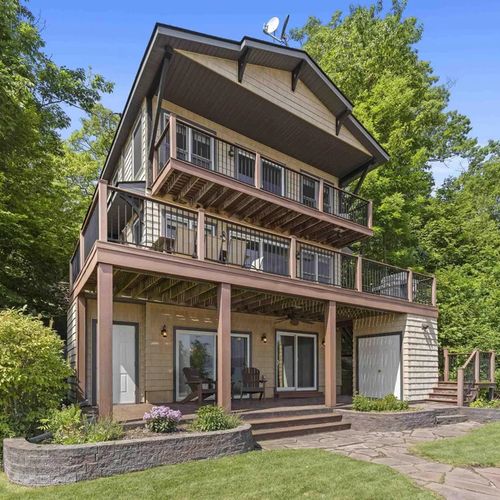 EXTERIOR:   Another photo of the back of the house