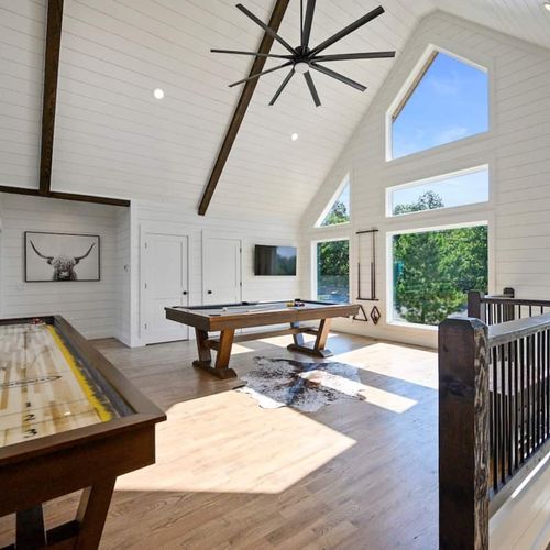 Upstairs takes you to the loft/game room. Futon not photographed.