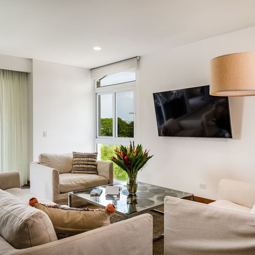 Relax on the couch to the sounds of the rolling waves.