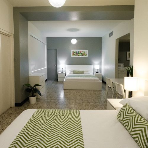 Discover a warm and inviting bedroom perfect for unwinding after a day of exploration. Every detail is crafted to ensure your comfort and satisfaction.