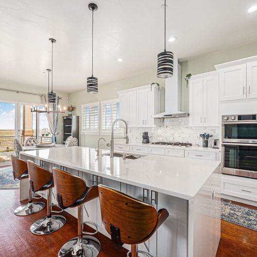 Contemporary kitchen with high-end appliances, sleek countertops, and everything ready for your next creation.