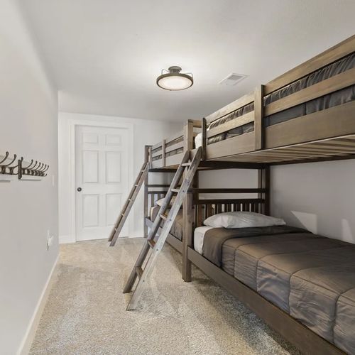 BEDROOM #6 (LOWER LEVEL):  Like Bedroom #5, this bedroom features 2 bunk beds and sleeps 4 people.