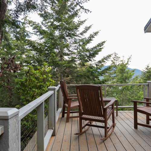 Enjoy the trees and large deck with friends and family.