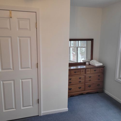 Bedroom #2 (upper level):  features a queen-size bed, great views of lake michigan, dresser, mirror, closet, desk, and private en suite full bathroom!