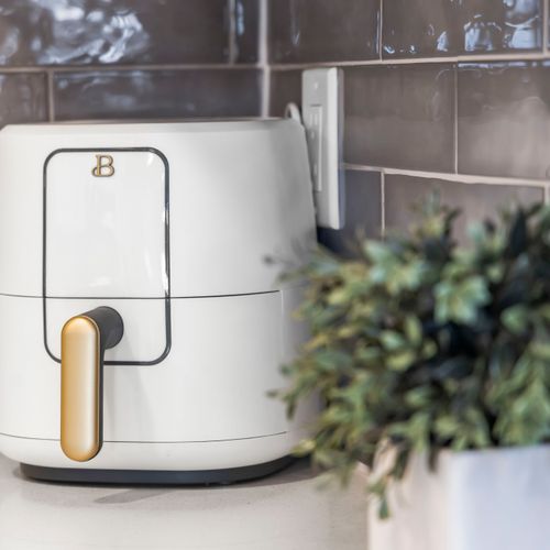 Sleek appliances and thoughtful extras ensure you have everything you need.