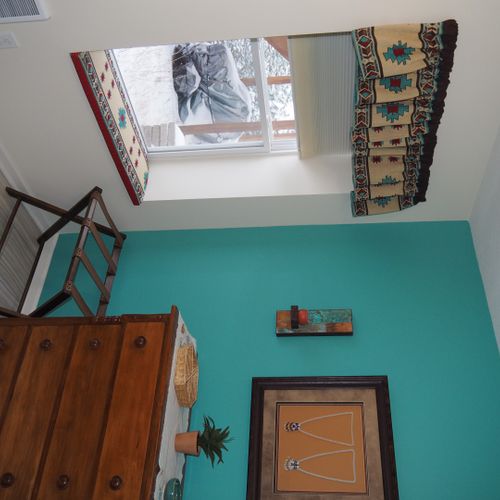 Bedroom:  very comfortable bedroom with a queen-size bed, ceiling fan, dresser, and mirror.
