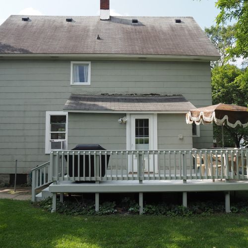 Exterior:  the home has a cute backyard deck with outdoor dining table and a propane grill.