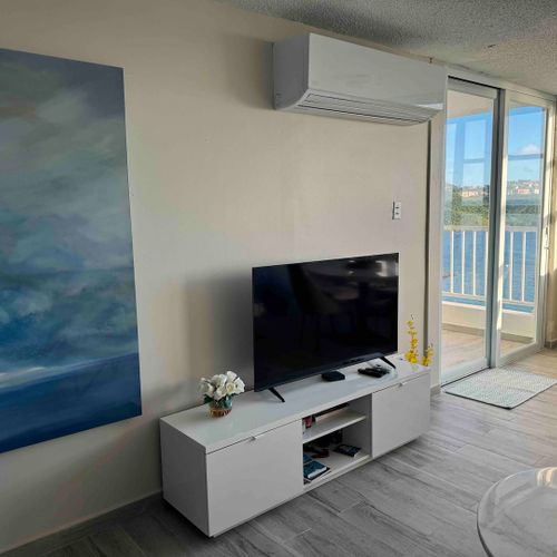 Relax in Style: Unwind in this chic and comfortable living space, perfect for movie nights or quiet evenings after exploring.