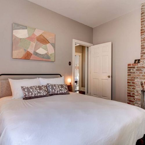 Bright second bedroom w/ a plush bed — comfortable space to rest & recharge.