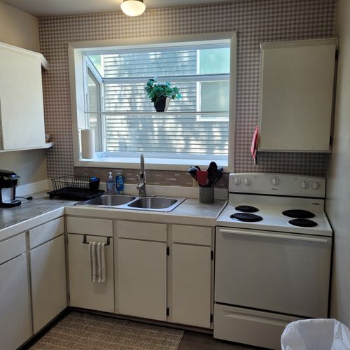 KITCHEN:  Recently updated kitchen with all appliances including a dishwasher and a good supply of cooking and dining utensils.