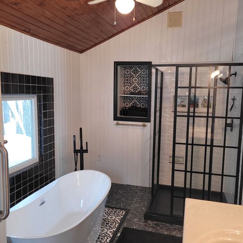 Bathroom #2 (second floor):  large and gorgeous bathroom with a soaking tub, walk-in shower, ceiling fan, mirror, vanity, sink, and a toilet with a bidet.