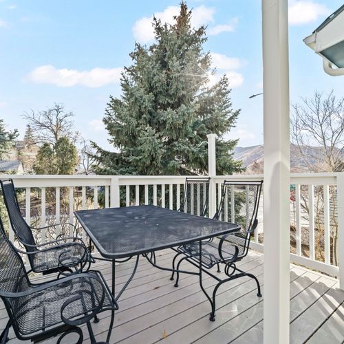 Enjoy this quiet outdoor seating surrounded by fresh air, trees, and mountain view.