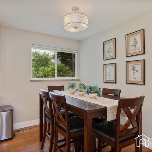 Savor every bite at the spacious dining table with seating for 6.
