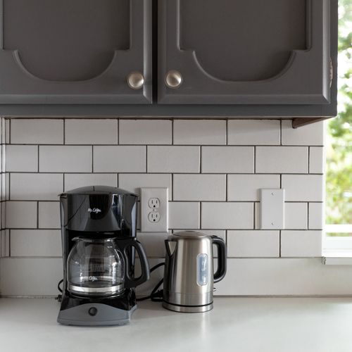 We offer a full coffee bar with sweetener, tea, hot cocoa, coffee, and creamer. A drip coffee maker, french press, coffee grinder, filters, and water kettle.