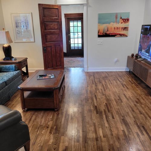 Living room #1 (main floor):  the home has a very stylish living room with a very large live-streaming television.
