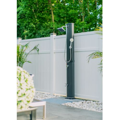 Outdoor shower available on the pool deck.