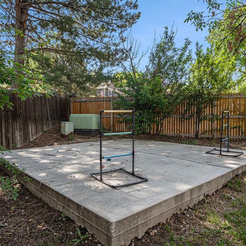 The spacious back yard of this home is the perfect place to relax and enjoy the great outdoors.
