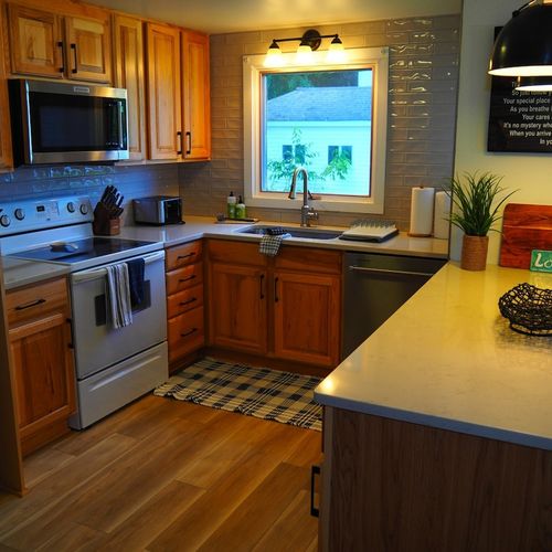 Kitchen:  the cottage has a newly-remodeled kitchen with all modern appliances, including a dishwasher and a little coffee bar. There is also a good supply of cooking and dining utensils provided.