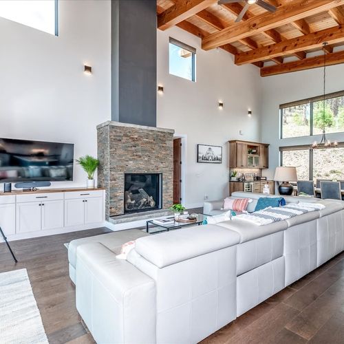 - gather around the tall stone fireplace for cozy nights in with your favorite shows
- vaulted ceilings and wood beams add rustic elegance to this luxe modern space
- every detail invites connection, comfort, and relaxed mountain living