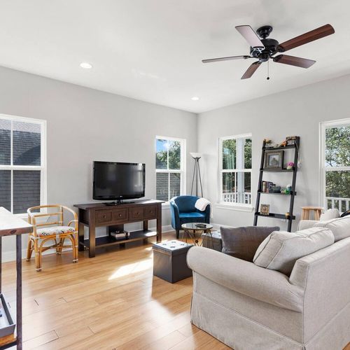 Living room w/ a TV & comfy sofa — great for movie nights in.
