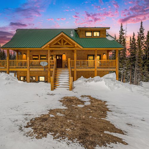 Welcome to our picturesque log cabin retreat, nestled on 10 beautiful acres of serene countryside.