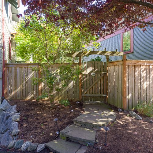 Private gated garden entrance for added seclusion.