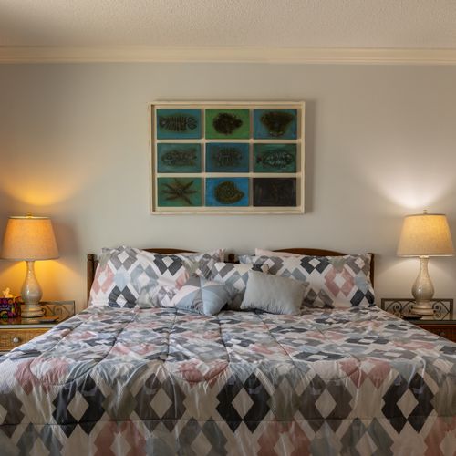 Sleep in comfort in the cozy king-sized bed–perfect for a restful night's sleep.