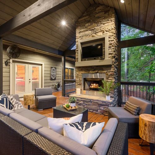A gas fireplace is at the heart of the main outdoor living area!
