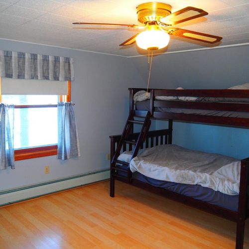 Bedroom #4 (second floor):  includes a twin on full bunk bed, ceiling fan, closet, and a great lake view!
