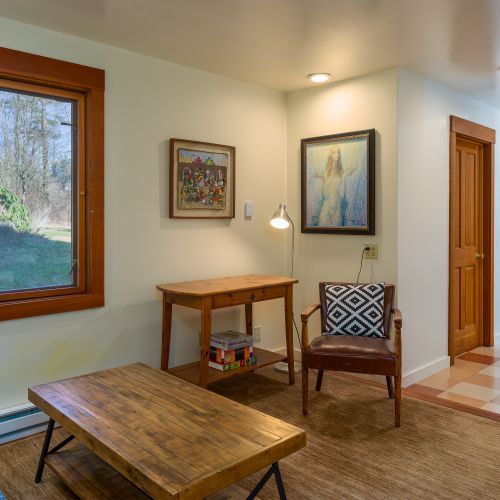 The game room with backgammon and puzzles off of the kitchen on the main level.