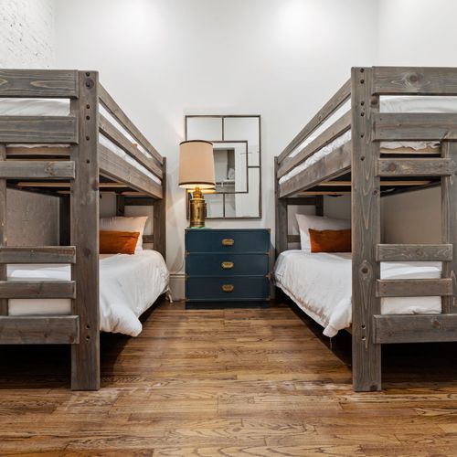 Bedroom 1 with four twin bunk beds perfect for groups