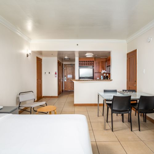 our open-concept oasis offers comfort and functionality, seamlessly blending rest and dining areas with a kitchenette.