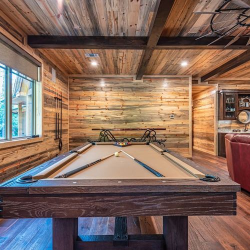 The pool table in the game room.