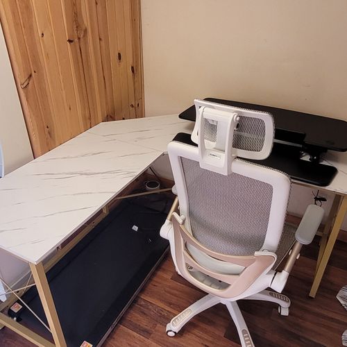 Office/laundry:  the office desk and rolling chair for laptop or pc use