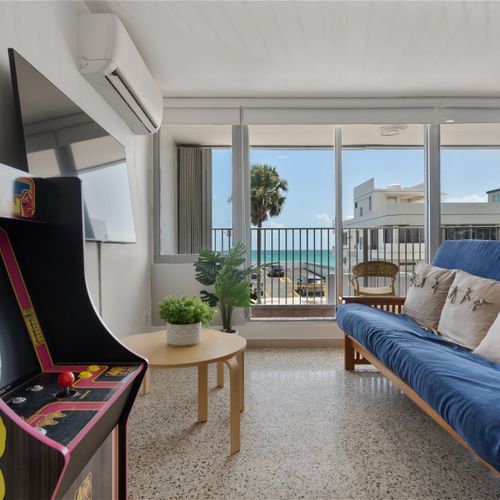 Unwind in our stylish living room with direct balcony access and refreshing views. Your perfect escape.