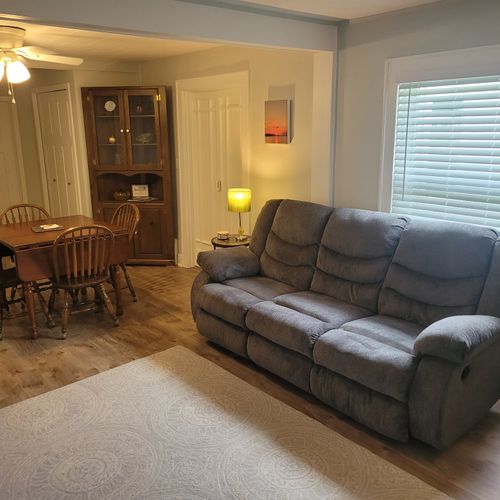 LIVING ROOM:  Very cozy living room with a sofa, loveseat, chair, and streaming television.